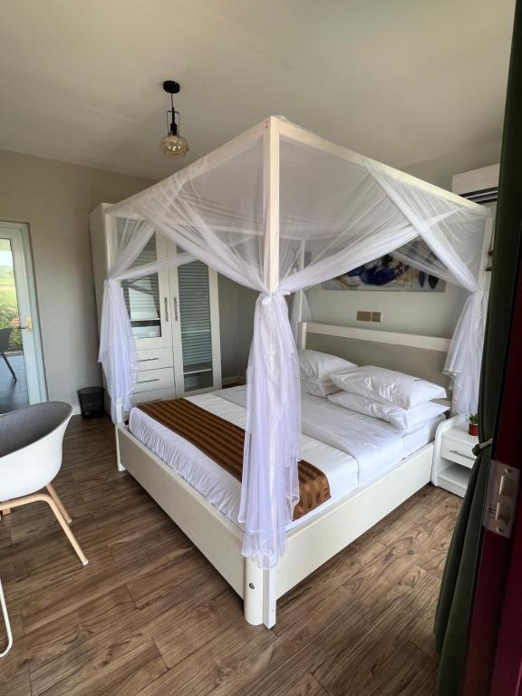 Postel nebo postele na pokoji v ubytování Zebi Ecolodge