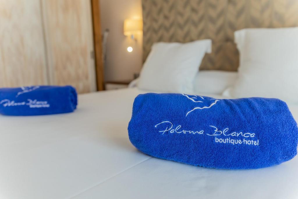 Posteľ alebo postele v izbe v ubytovaní Paloma Blanca Boutique Hotel