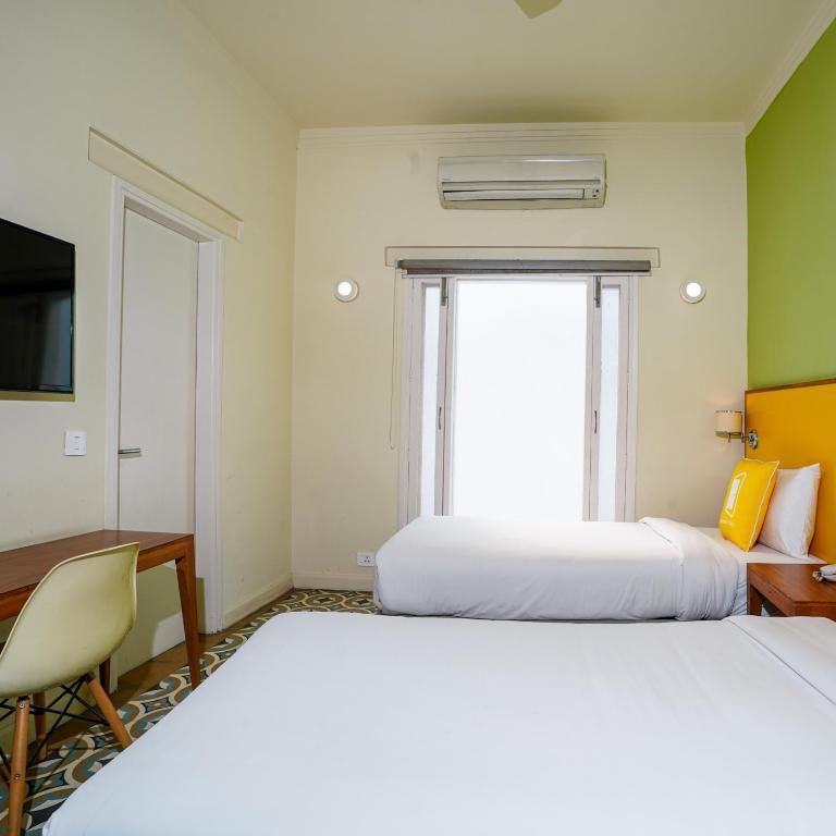 Postel nebo postele na pokoji v ubytování Bloom Boutique l Signature Towers