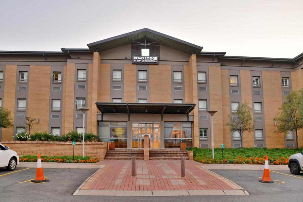 a hotel with a sign on the front of it at Road Lodge Southgate in Southgate