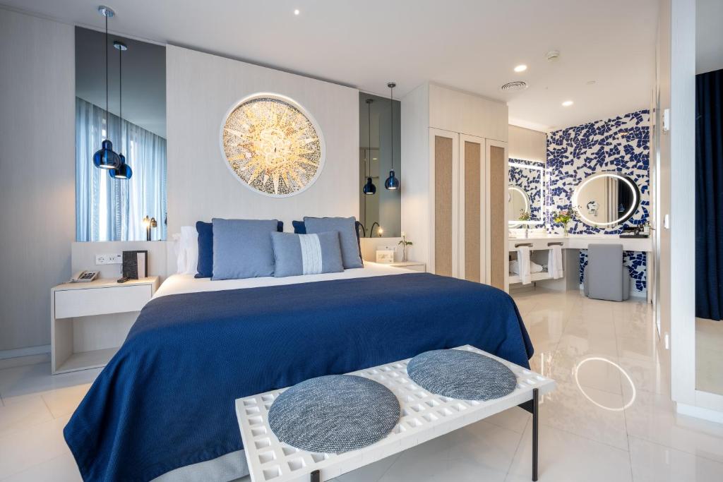 מיטה או מיטות בחדר ב-Hotel Porta Fira 4* Sup