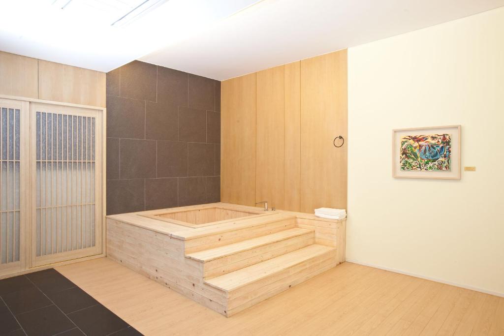 Postel nebo postele na pokoji v ubytování Yuwon Hotel