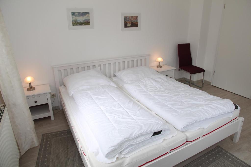 Postel nebo postele na pokoji v ubytování Jan Dollart 1
