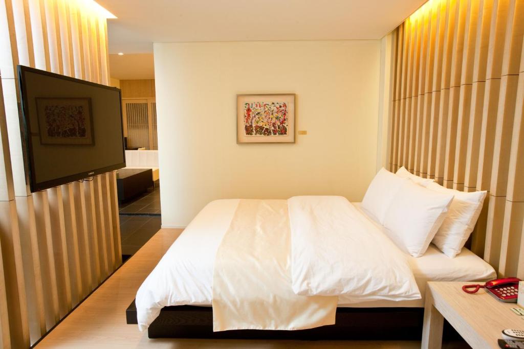 TV a/nebo společenská místnost v ubytování Yuwon Hotel