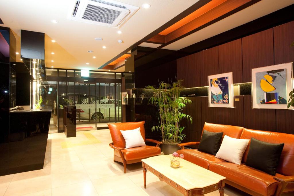 TV a/nebo společenská místnost v ubytování Yuwon Hotel