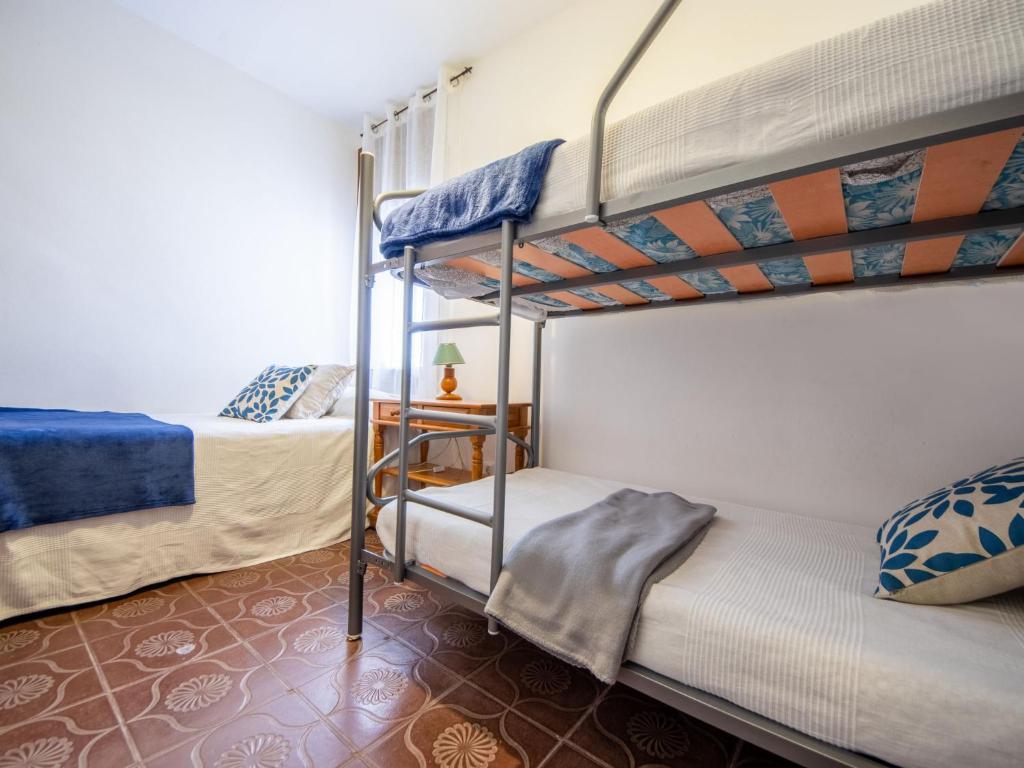 Postel nebo postele na pokoji v ubytování Holiday Home Moru by Interhome