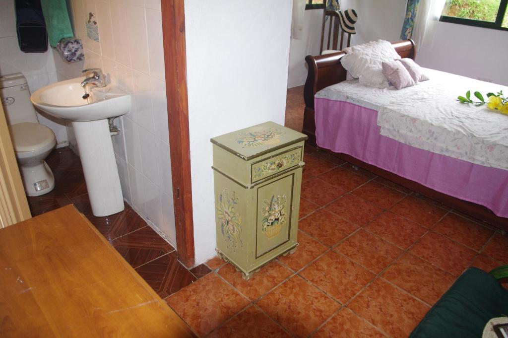 Postel nebo postele na pokoji v ubytování Papaya Guesthouse