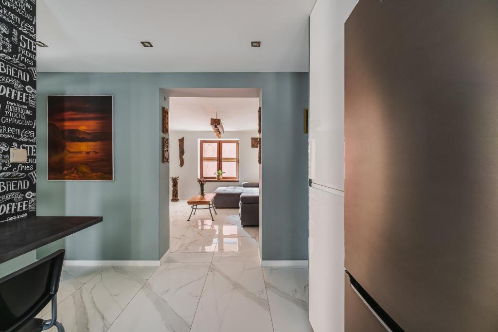 Posteľ alebo postele v izbe v ubytovaní Apartament w Centrum Szczawnicy