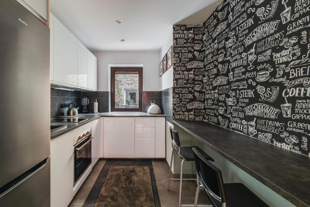 Kuchyňa alebo kuchynka v ubytovaní Apartament w Centrum Szczawnicy