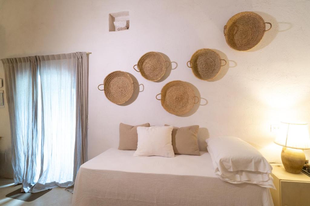 Postel nebo postele na pokoji v ubytování Masseria Soluco