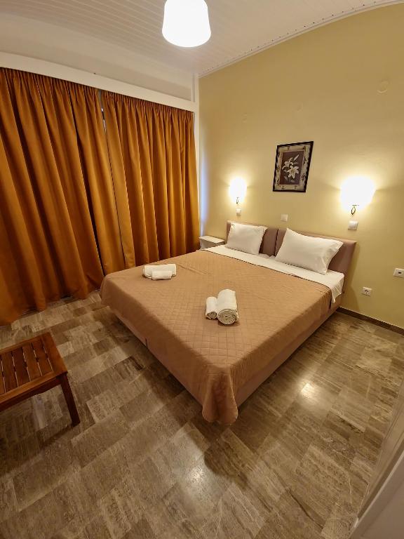 Postel nebo postele na pokoji v ubytování Alexandra Apartment 13