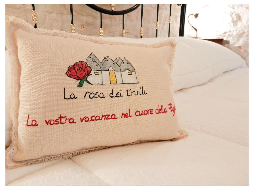 Posteľ alebo postele v izbe v ubytovaní La Rosa dei Trulli B&B