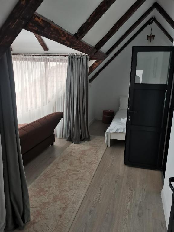 Postel nebo postele na pokoji v ubytování Casa Dorin