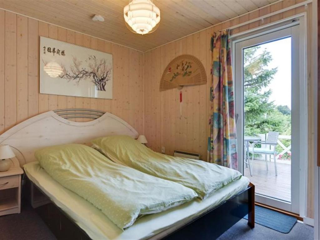 Postel nebo postele na pokoji v ubytování Holiday Home Eleana - 300m to the inlet by Interhome