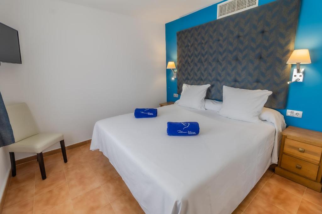 Posteľ alebo postele v izbe v ubytovaní Paloma Blanca Boutique Hotel