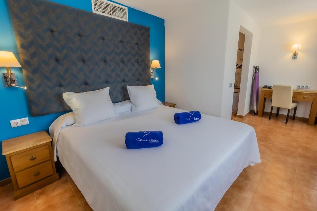 Posteľ alebo postele v izbe v ubytovaní Paloma Blanca Boutique Hotel