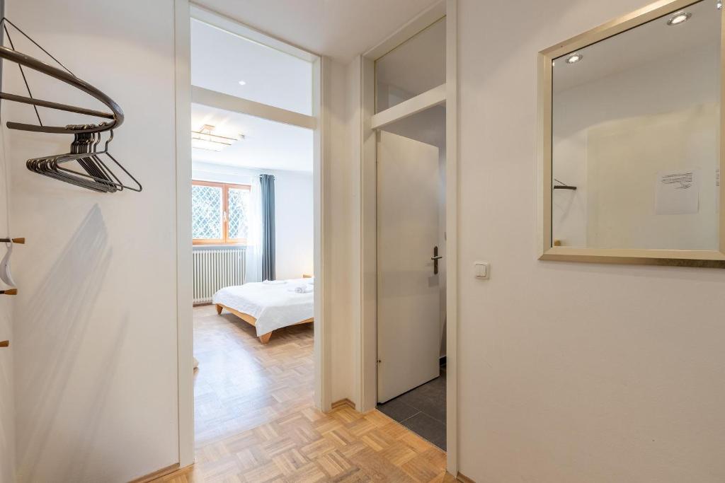 Postel nebo postele na pokoji v ubytování Serviced Appartement München Messe