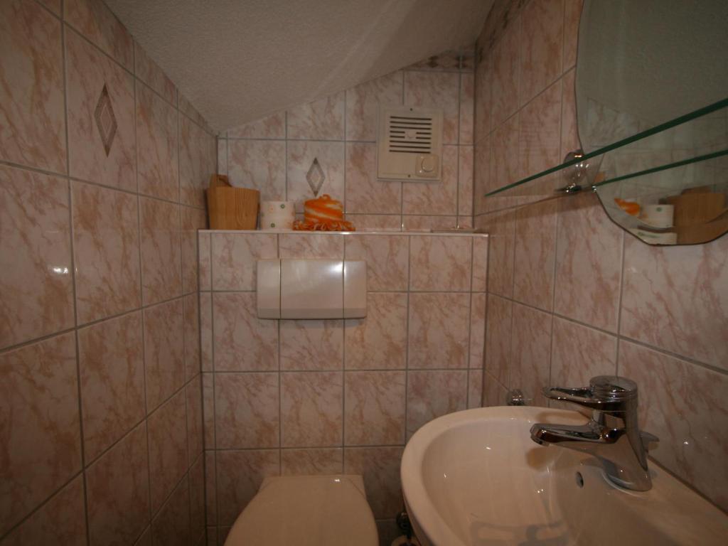 Koupelna v ubytování Apartment Tom by Interhome