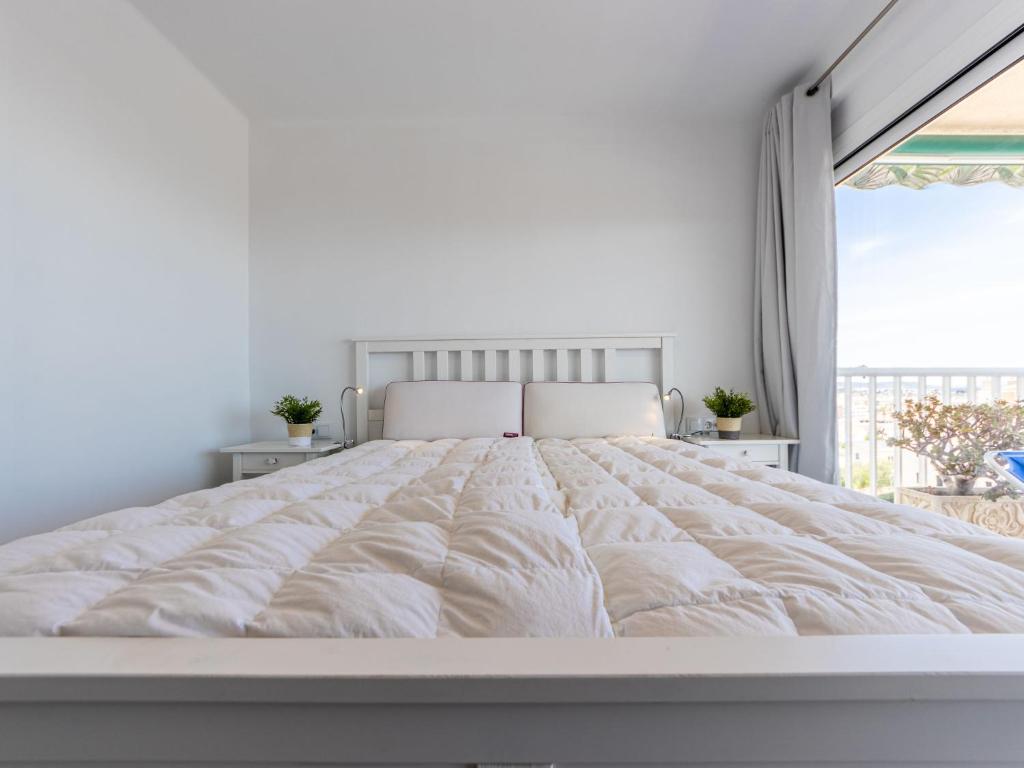 Posteľ alebo postele v izbe v ubytovaní Apartment Rapova by Interhome