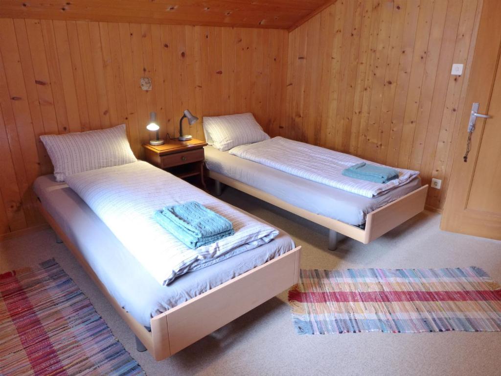 Postel nebo postele na pokoji v ubytování Apartment Vreneli by Interhome