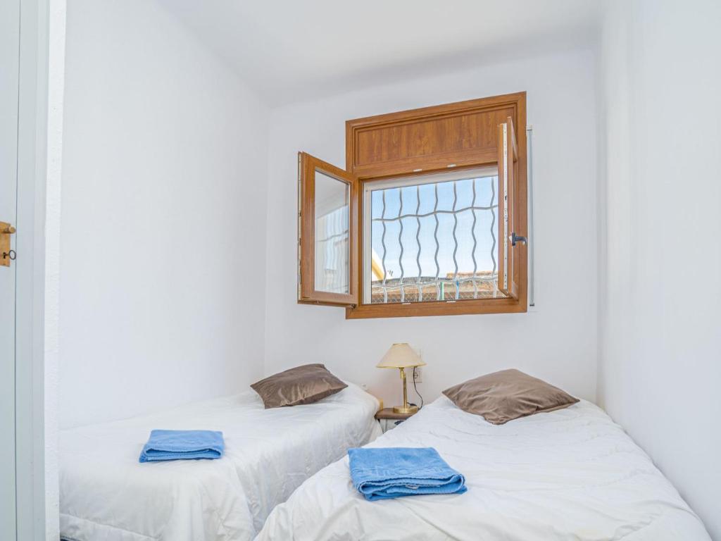 Posteľ alebo postele v izbe v ubytovaní Holiday Home Cala by Interhome