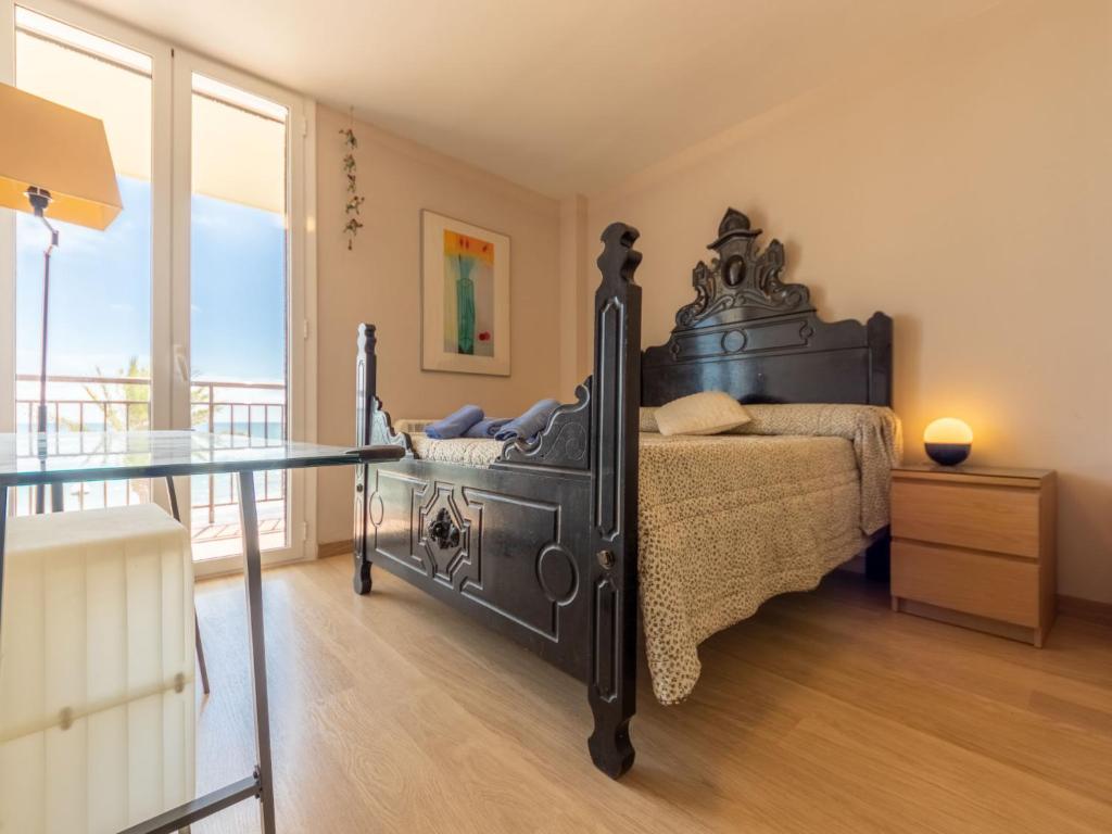 Postel nebo postele na pokoji v ubytování Apartment Miramar by Interhome