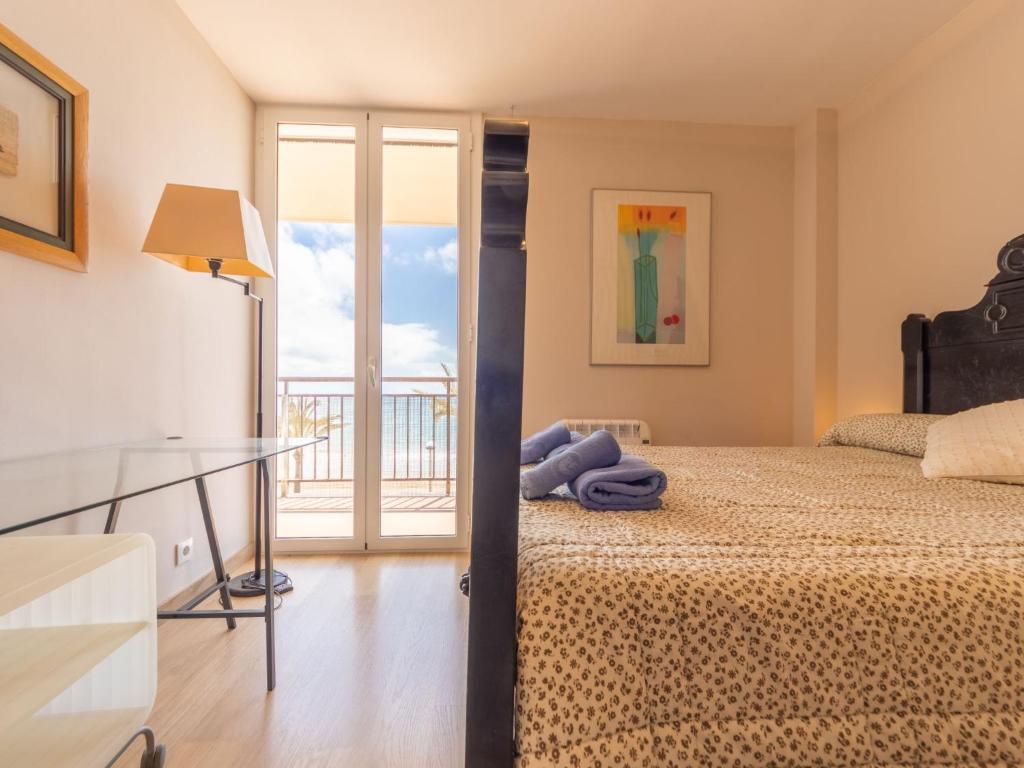 Postel nebo postele na pokoji v ubytování Apartment Miramar by Interhome