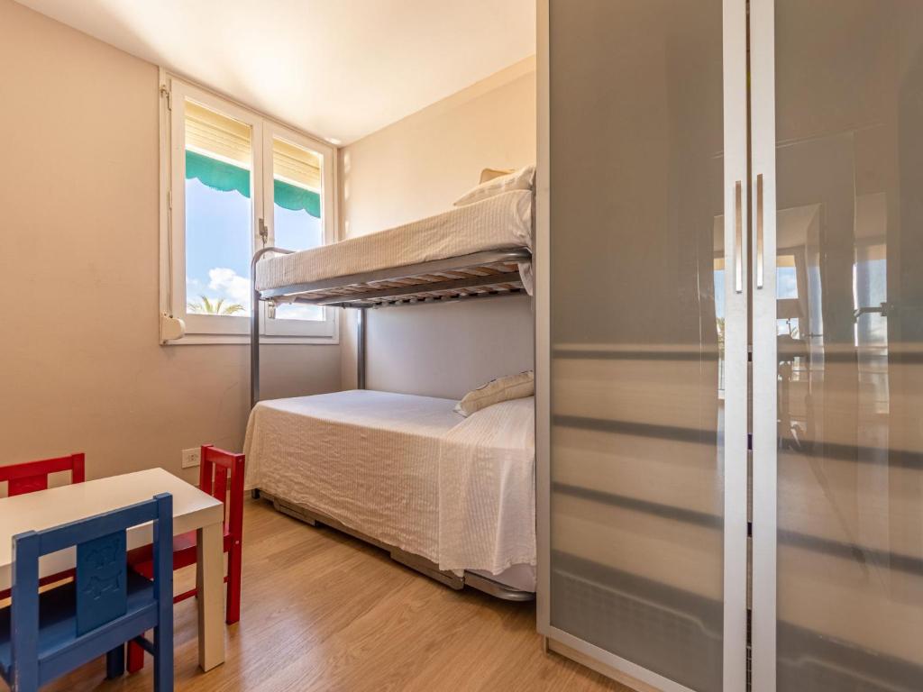 Postel nebo postele na pokoji v ubytování Apartment Miramar by Interhome