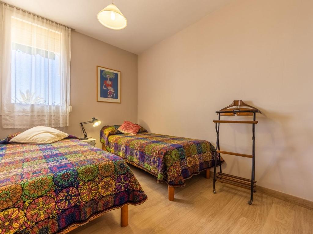 Postel nebo postele na pokoji v ubytování Apartment Miramar by Interhome