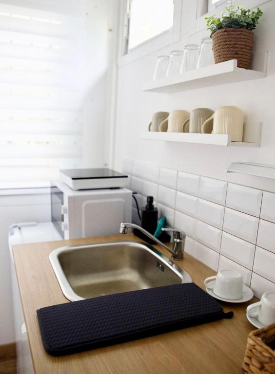 Kuchyň nebo kuchyňský kout v ubytování Nordin Apartman