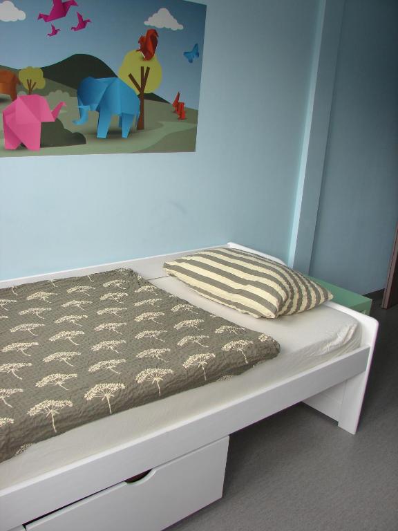 Postel nebo postele na pokoji v ubytování Hostel Browar Jedlinka