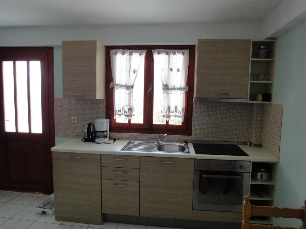 Kuchyňa alebo kuchynka v ubytovaní Zambia Apartments