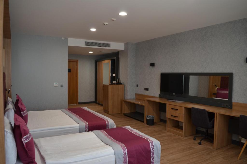 TV a/nebo společenská místnost v ubytování Lavanta Tepesi Hotel ve Spor Tesisleri