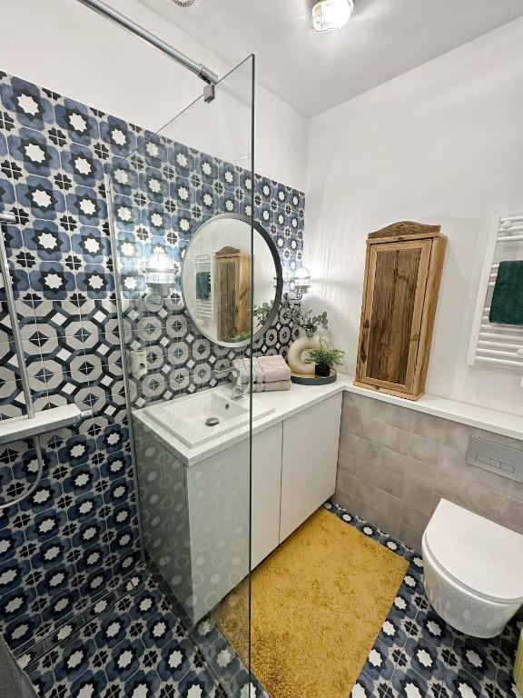 Kúpeľňa v ubytovaní Lofts Cracow Apartments - City Center