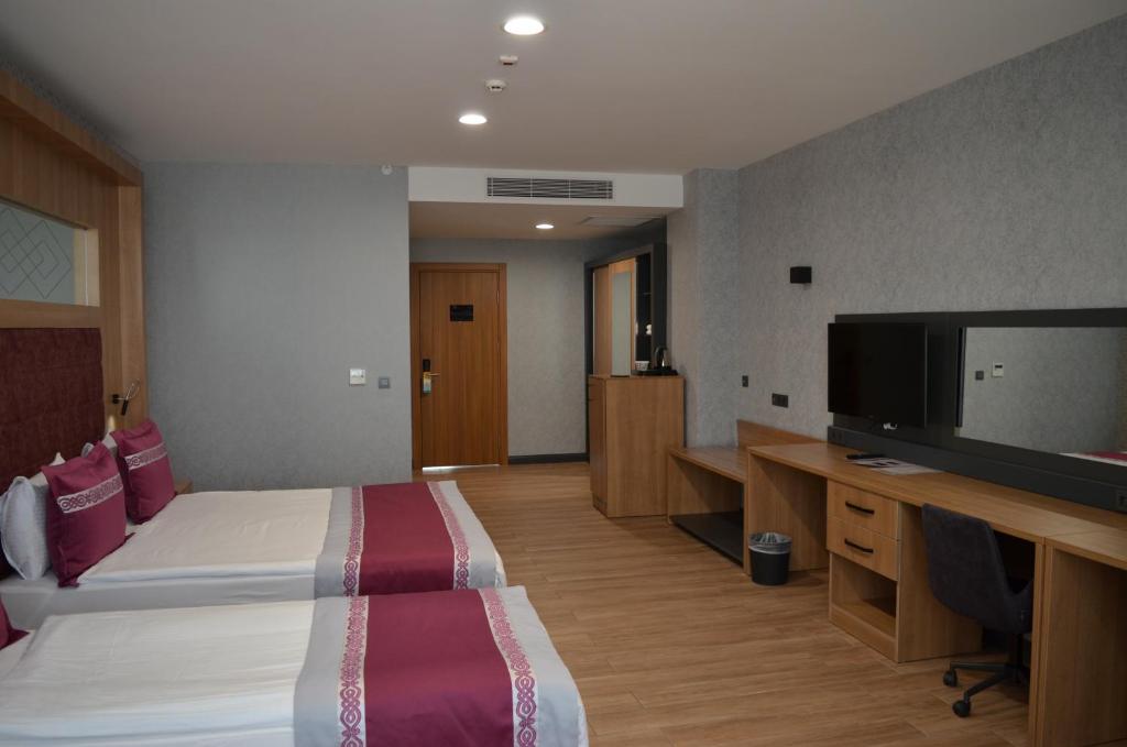 TV a/nebo společenská místnost v ubytování Lavanta Tepesi Hotel ve Spor Tesisleri