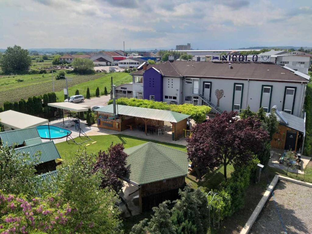 an aerial view of a house with a yard at Garni Hotel & Spa Nicolo in Kruševac