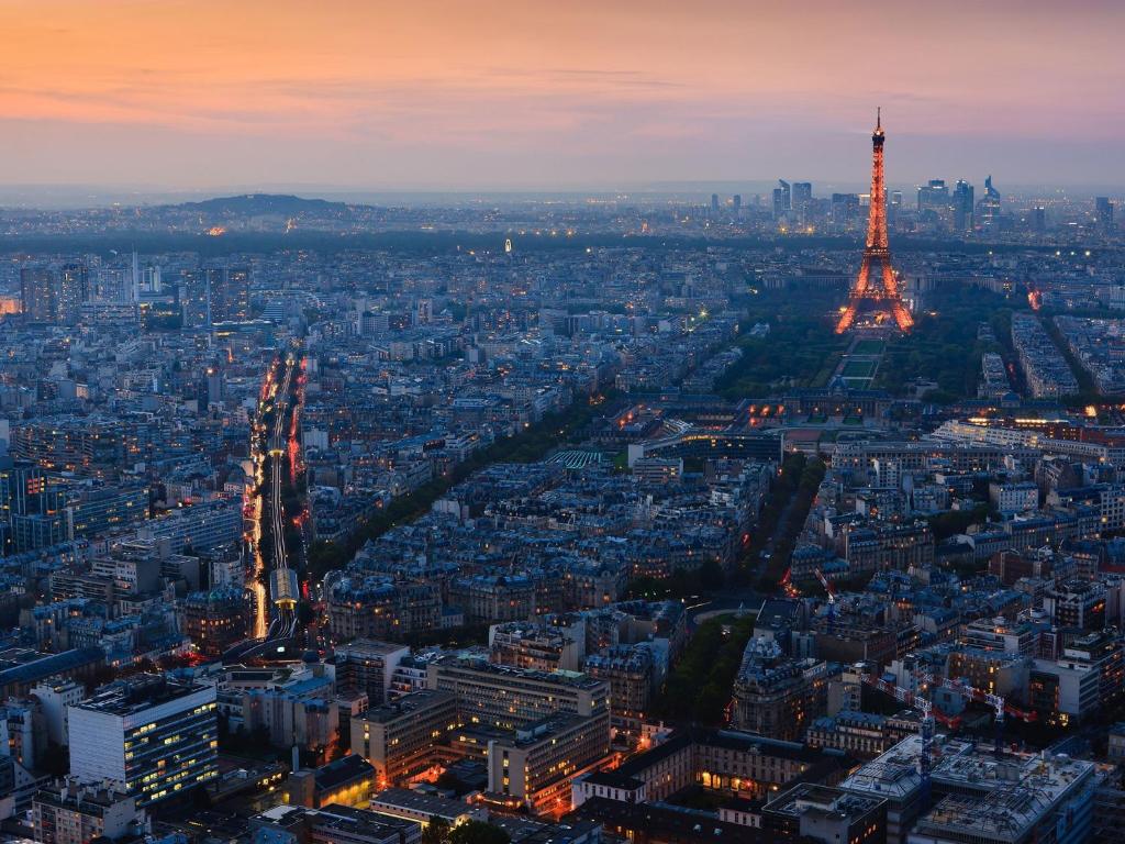an aerial view of the eiffel tower at night at Studio Passy - Tour Eiffel in Paris