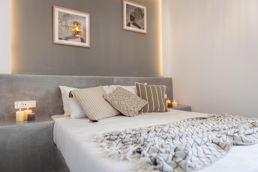 Postel nebo postele na pokoji v ubytování White Breeze Villas