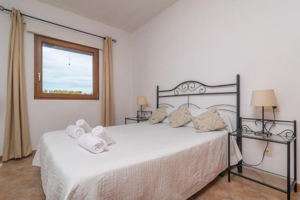 Postel nebo postele na pokoji v ubytování Son Barrigo