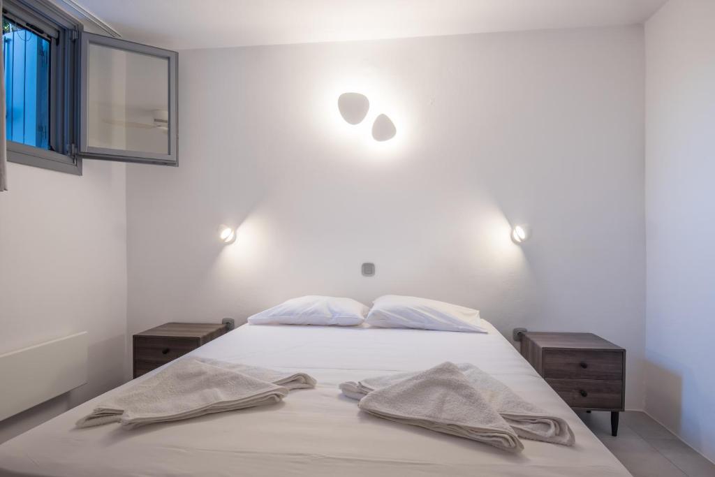 Posteľ alebo postele v izbe v ubytovaní Seaview Villa Euterpe