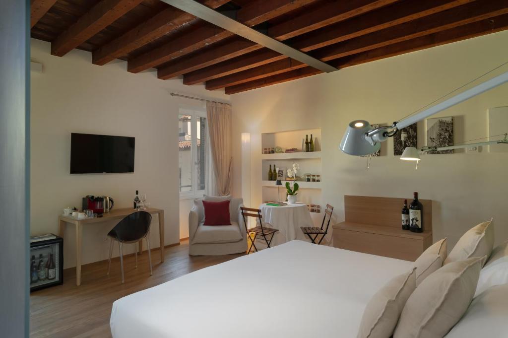 TV a/nebo společenská místnost v ubytování Massimago Wine Suites