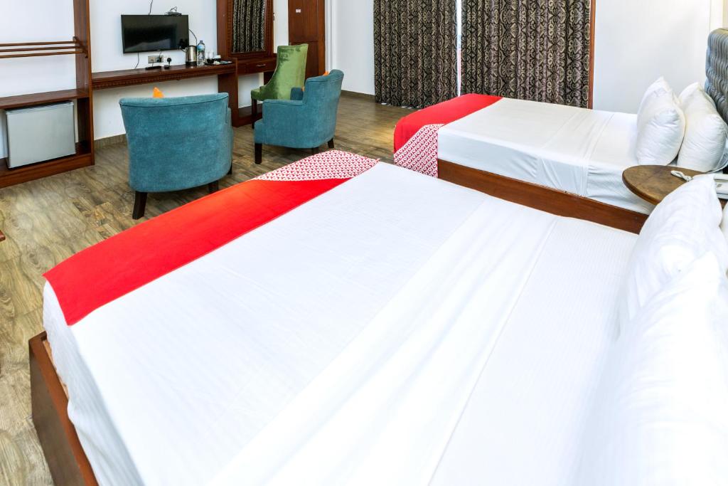 Postel nebo postele na pokoji v ubytování Polhena Grand Resort & Banquet