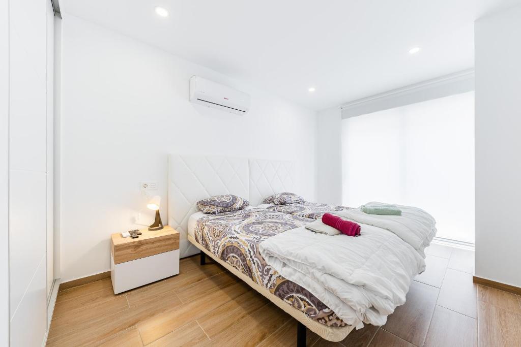 Postel nebo postele na pokoji v ubytování Apartamento Sunrise Chapaprieta