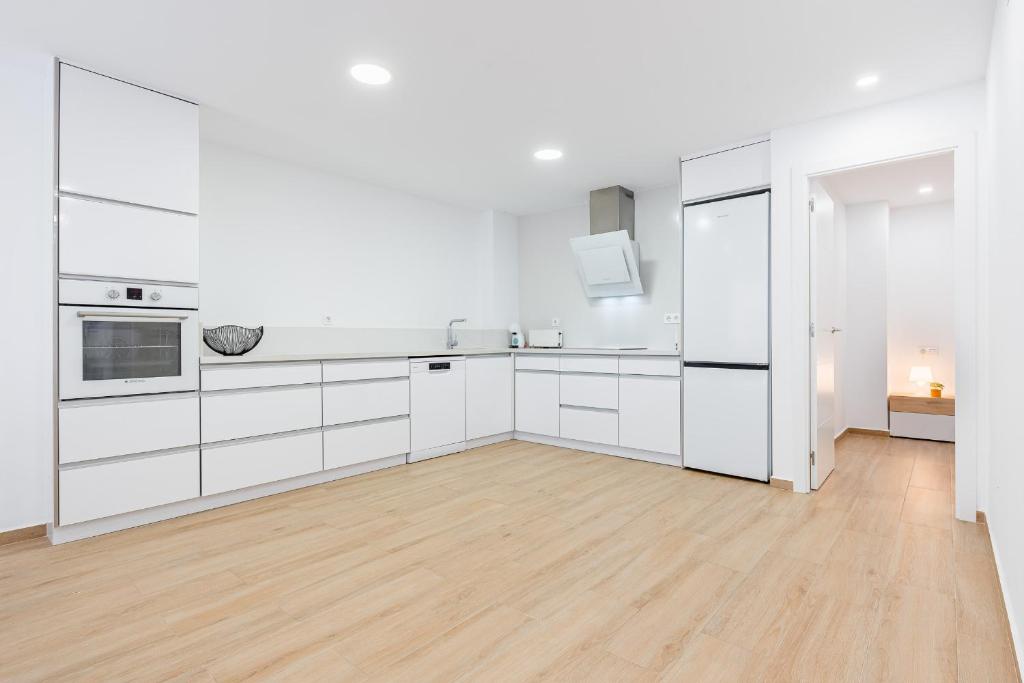 Kuchyň nebo kuchyňský kout v ubytování Apartamento Sunrise Chapaprieta