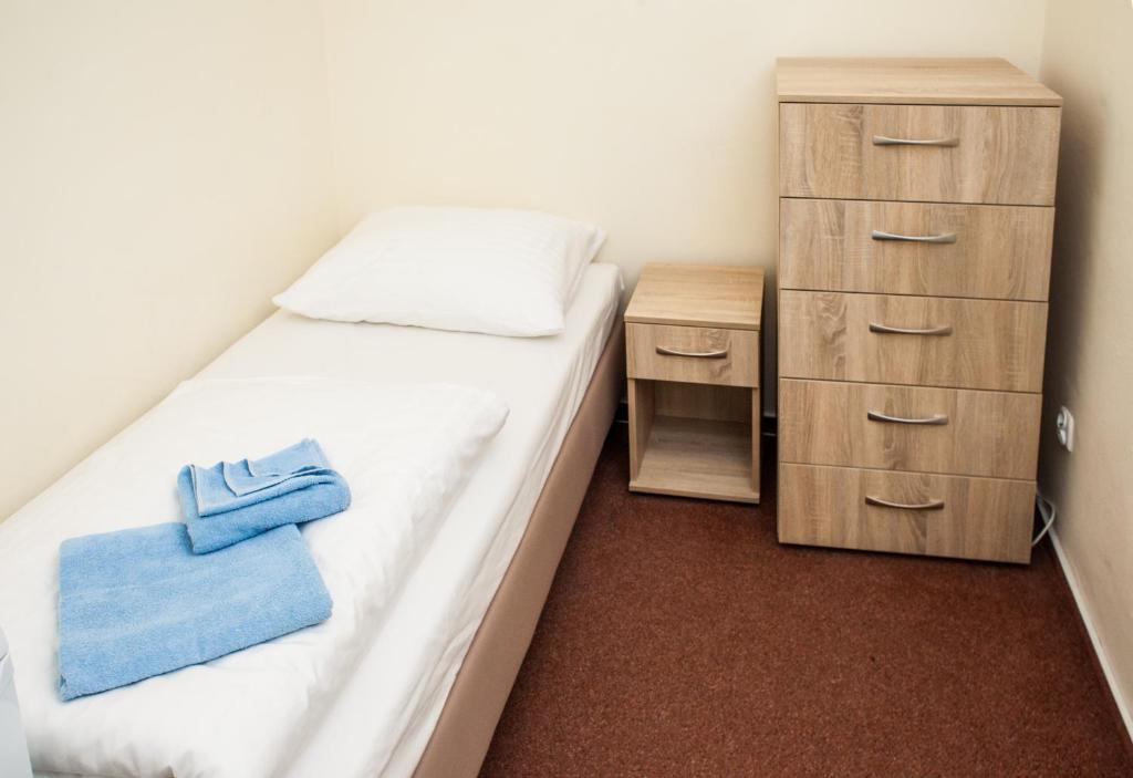 Postel nebo postele na pokoji v ubytování OSW Kaper
