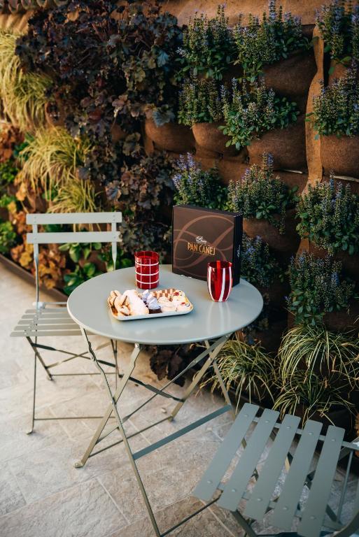 Patio nebo venkovní prostory v ubytování San Tommaso Suites