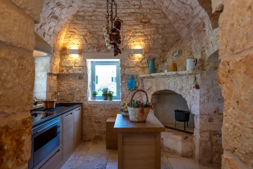 Kuchyňa alebo kuchynka v ubytovaní Ostuni Art Resort