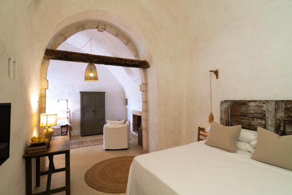 Postel nebo postele na pokoji v ubytování Masseria Soluco