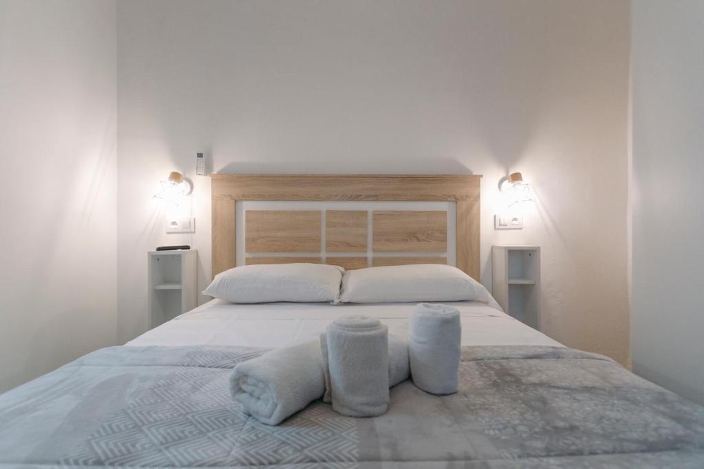 Posteľ alebo postele v izbe v ubytovaní O&L San Luis Feel at Home in a Renovated Apartment