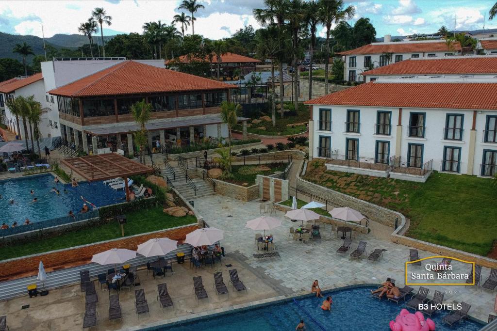 an aerial view of a resort with a swimming pool at Resort Quinta Santa Bárbara OFICIAL in Pirenópolis
